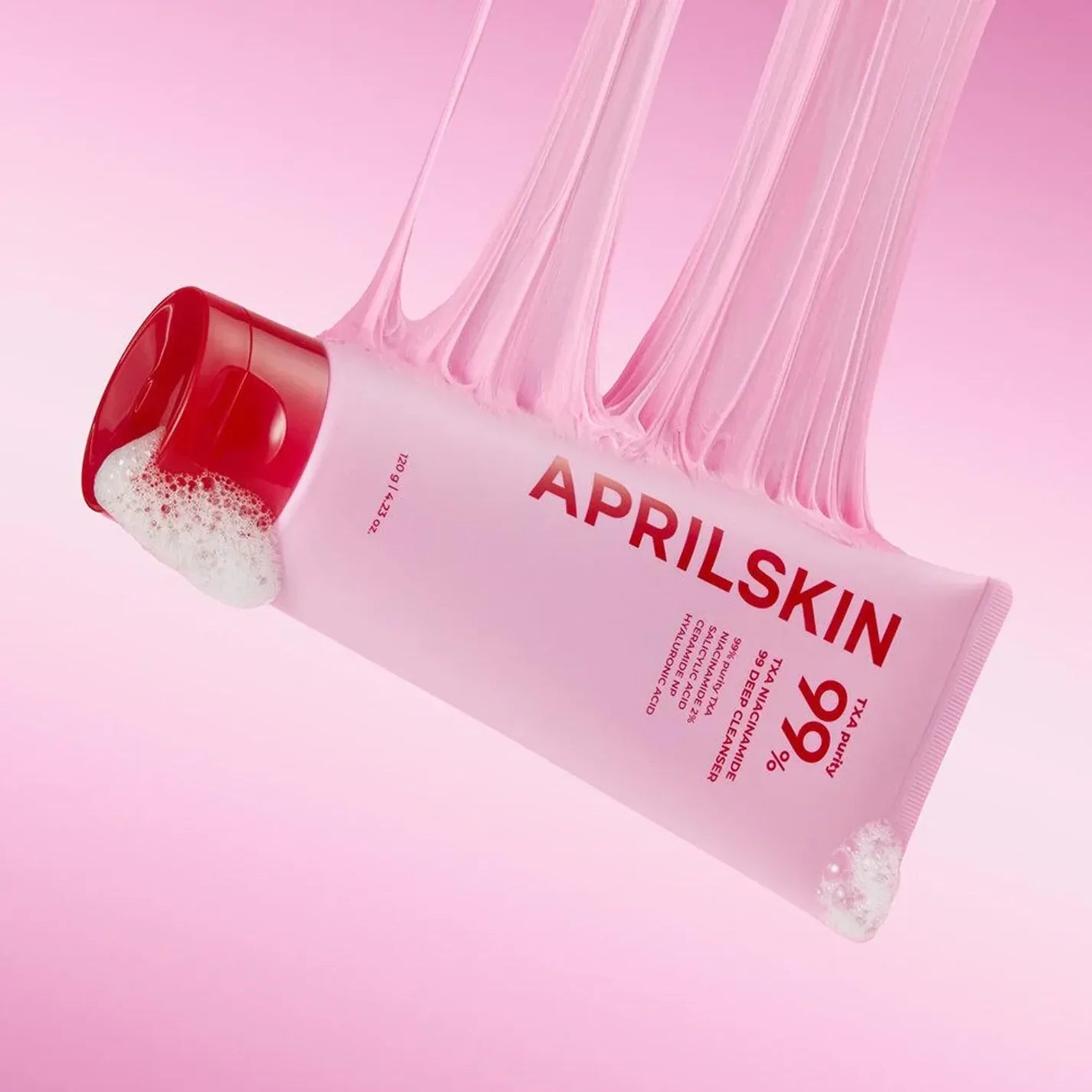 Close-up of APRILSKIN TXA Niacinamide 99 Deep Cleanser packaging highlighting its pore-cleansing and skin-brightening benefits.