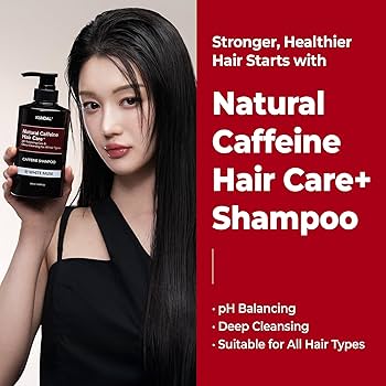 Close-up of KUNDAL Natural Caffeine Hair Care Shampoo Baby Powder packaging highlighting its caffeine-infused formula and soft baby powder fragrance.