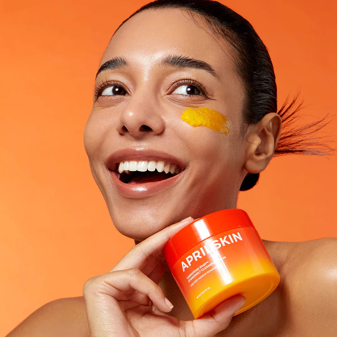 APRILSKIN Carrotene IPMP Hydramelt Cleansing Balm melts into a silky cleansing oil