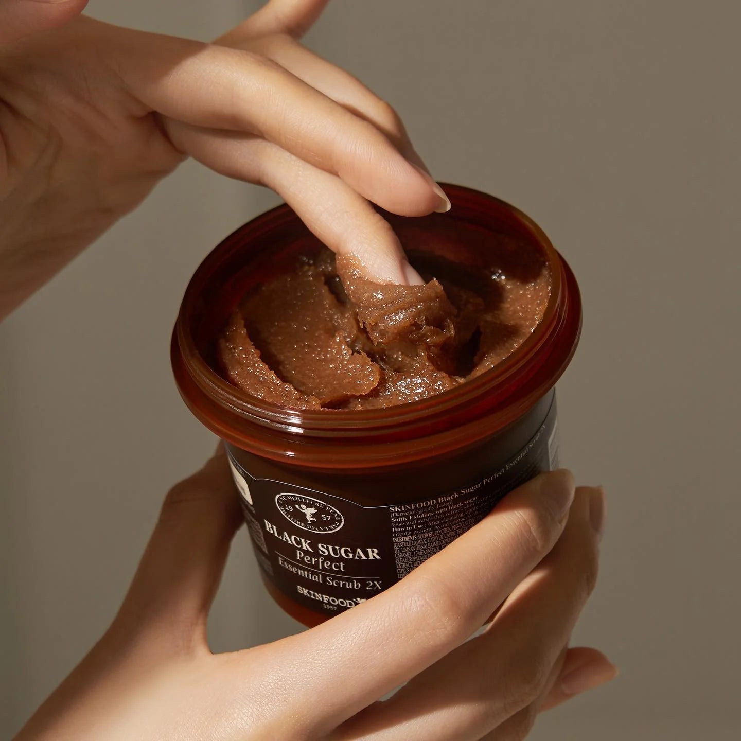 SKINFOOD Black Sugar Perfect Essential Scrub 2X — black sugar granules gently buff away dead skin
